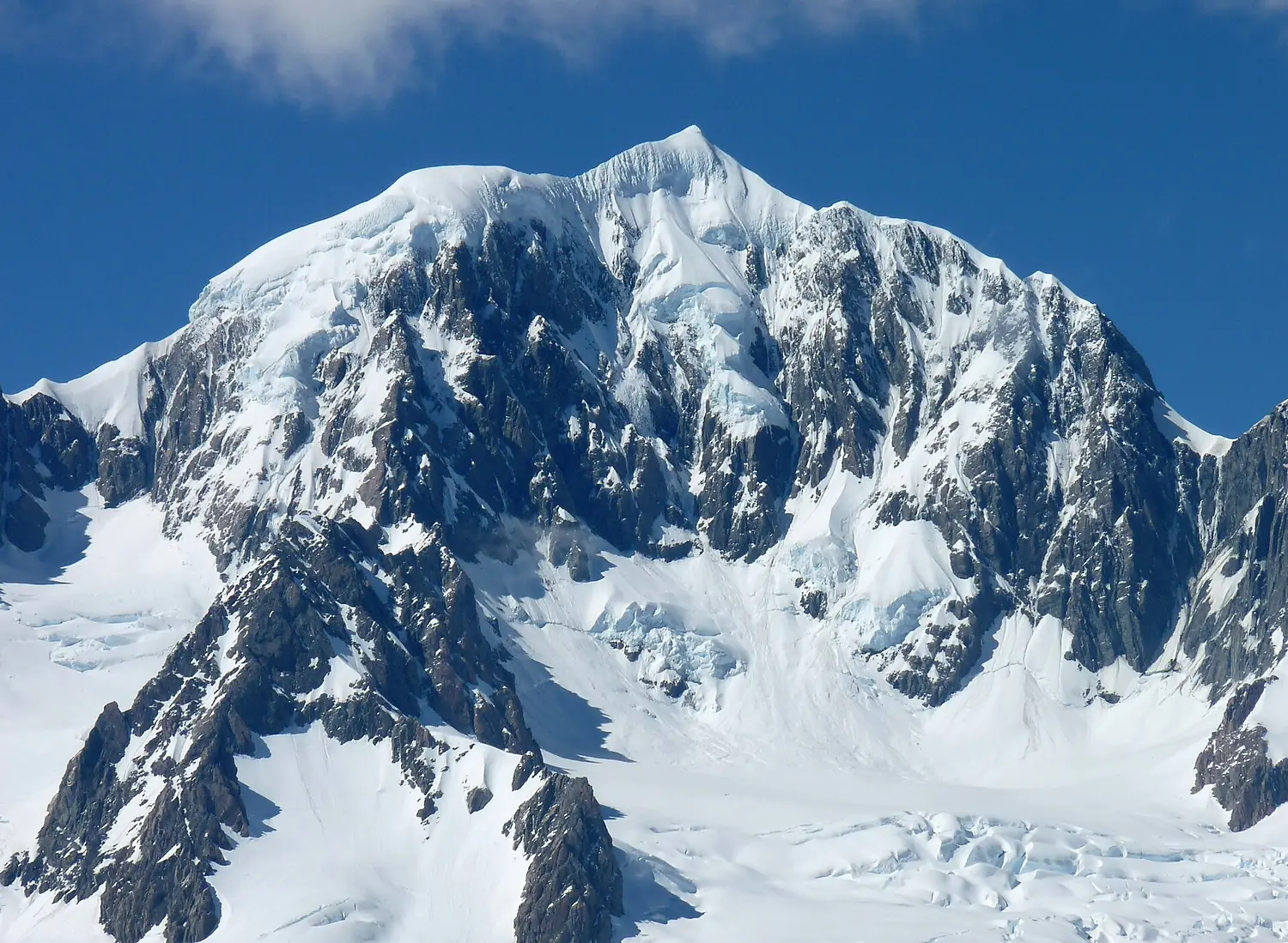 Mt Tasman viewed from north at helicopter landing on Fox nevé NZ Fri Nov 28 2008