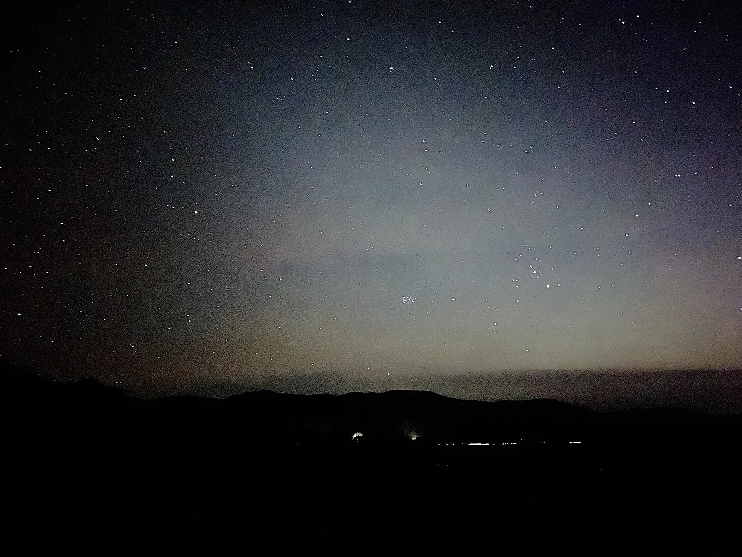 Matariki rising over Park mountain range