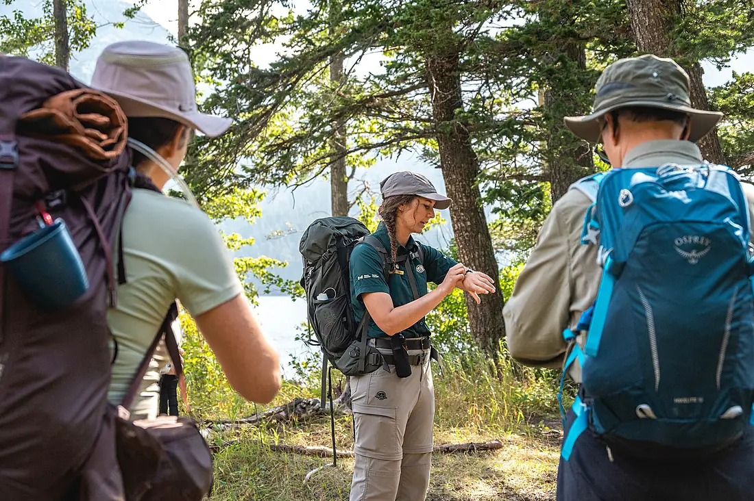 A Waterton Lakes employee leads an International Peace Park hike (53171873638)